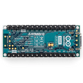 Electronic circuit board with microcontroller on a white background